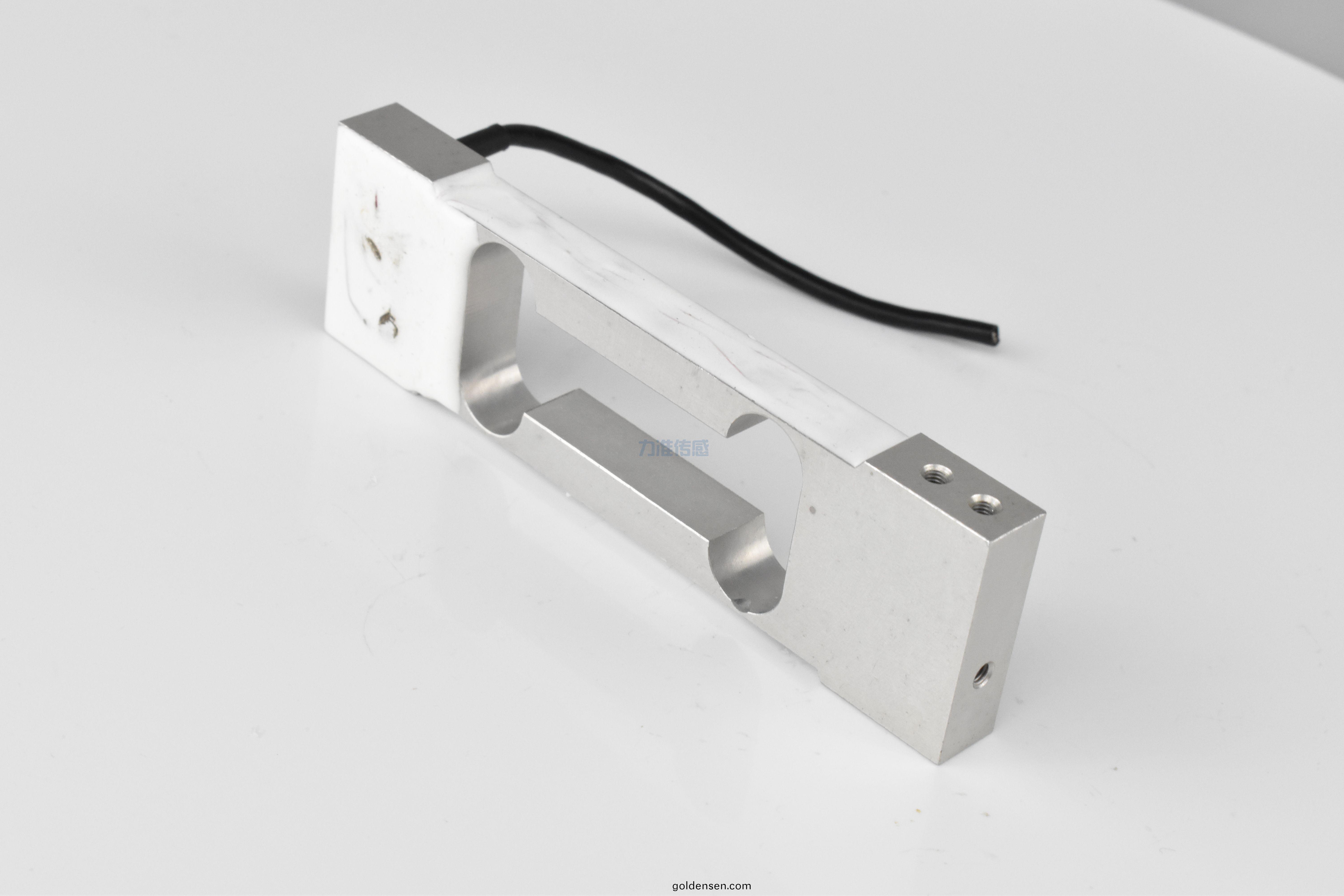 稱重傳感器昰稱(cheng)重衡器上(shang)使用的一種力傳感器(圖1) DSC_0754.JPG